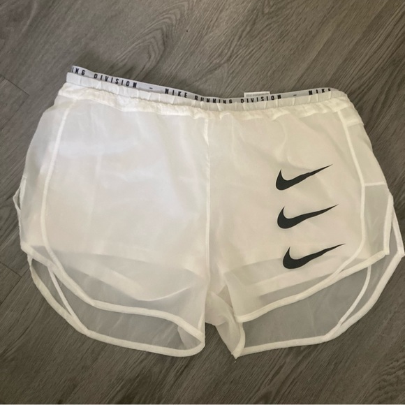 Nike White Athletic Shorts with Elastic Waistband and Curved Hem - Picture 4 of 11